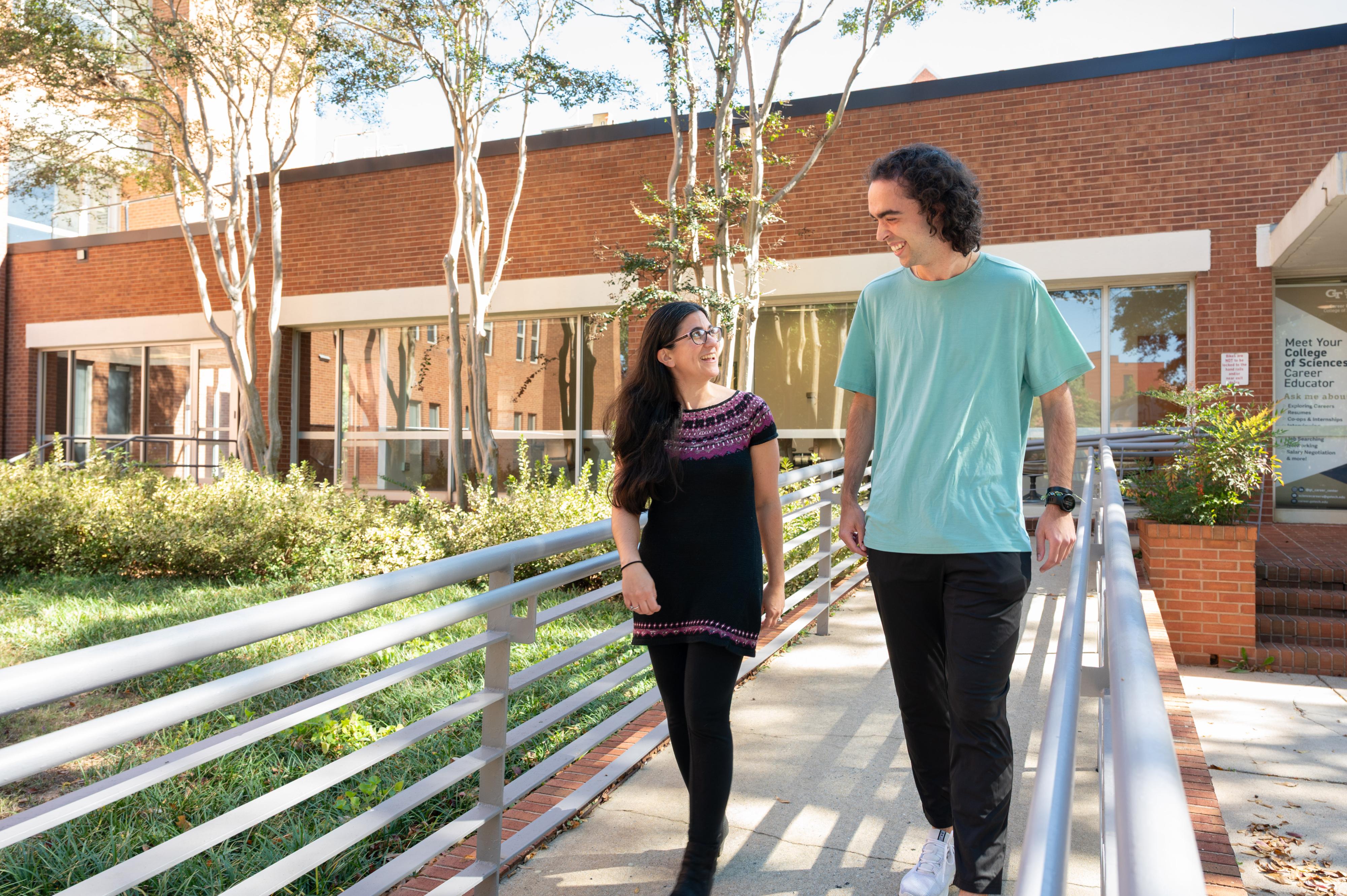 Student and faculty on campus